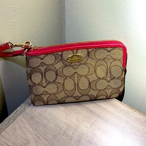 Pink coach wristlet